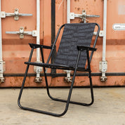 Hoonigan SCATTER CENSOR BAR collapsible chair in black and white, featuring a unique design with Hoonigan logo, set against a plain background.