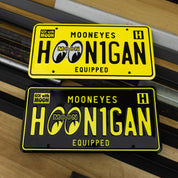 Hoonigan x Mooneyes EQUIPPED license plates featuring bold graphics and vibrant colors for automotive enthusiasts.