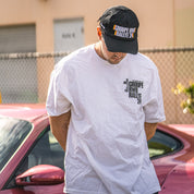 Hoonigan X RWB GROUPE RALLYE short sleeve tee featuring a bold graphic design, black color, and relaxed fit, ideal for motorsport enthusiasts.
