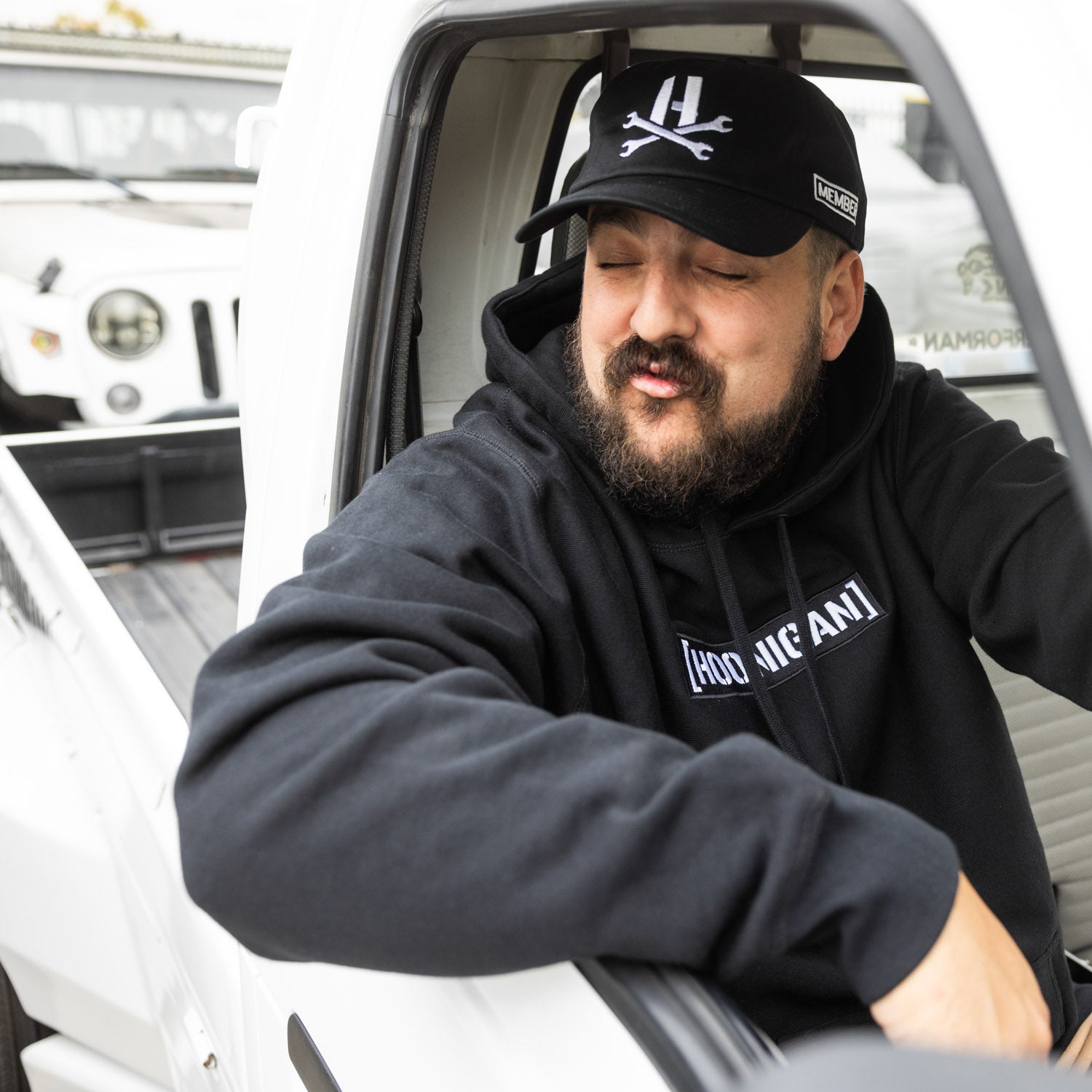 Hoonigan MAYHEM unstructured strapback hat in black with embroidered logo on front.