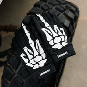 Hoonigan FIND OUT Gloves featuring black and white design with bold logo and grip-enhancing texture.