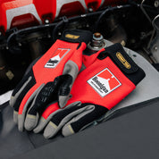 Hoonigan Surgeon General Gloves featuring a sleek black design with bold white graphics and logo.