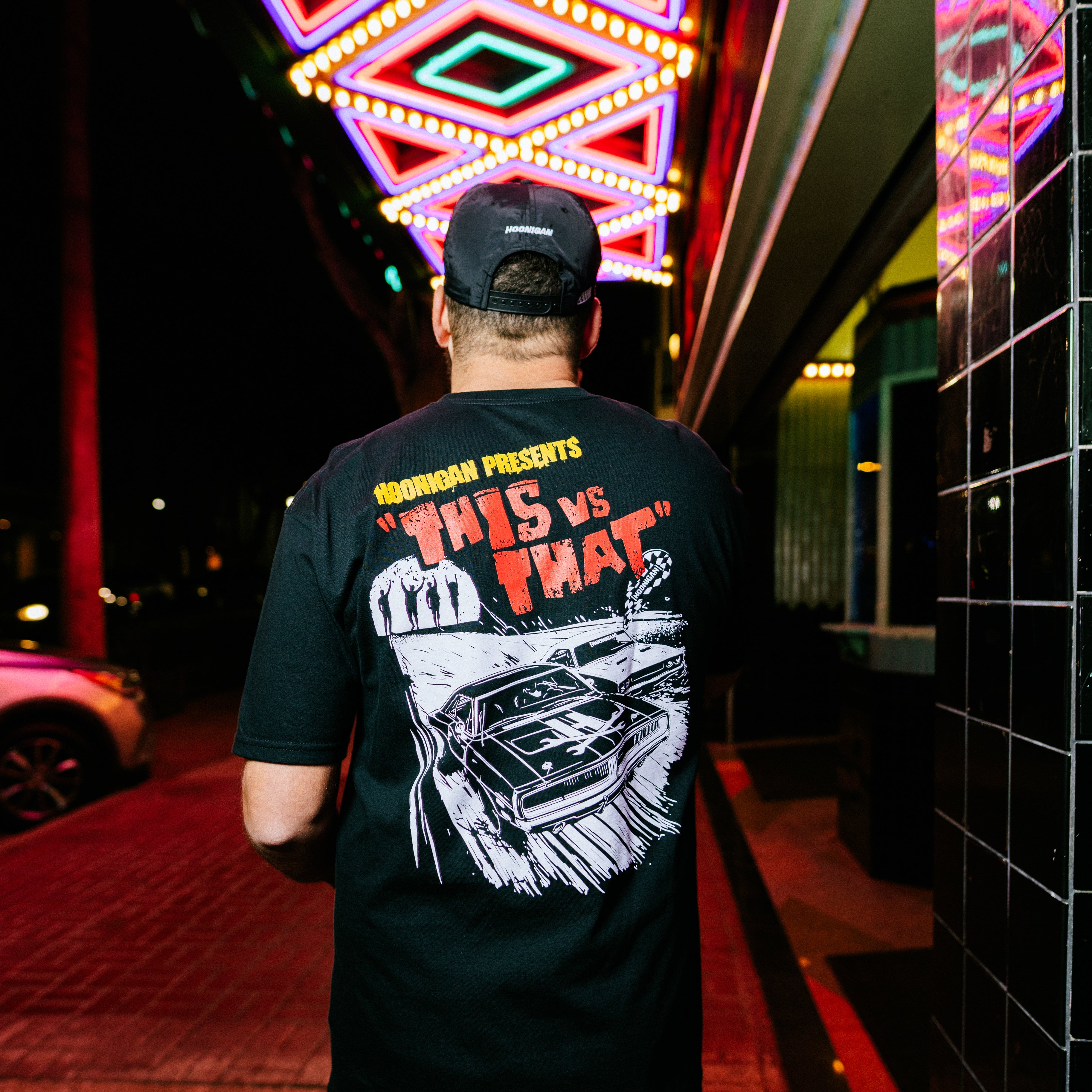 Hoonigan DOUBLE FEATURE Short Sleeve Tee in black featuring bold graphic designs on the front and back.