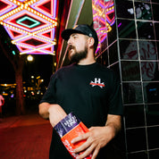 Hoonigan DOUBLE FEATURE Short Sleeve Tee featuring bold graphic designs on a classic black background.