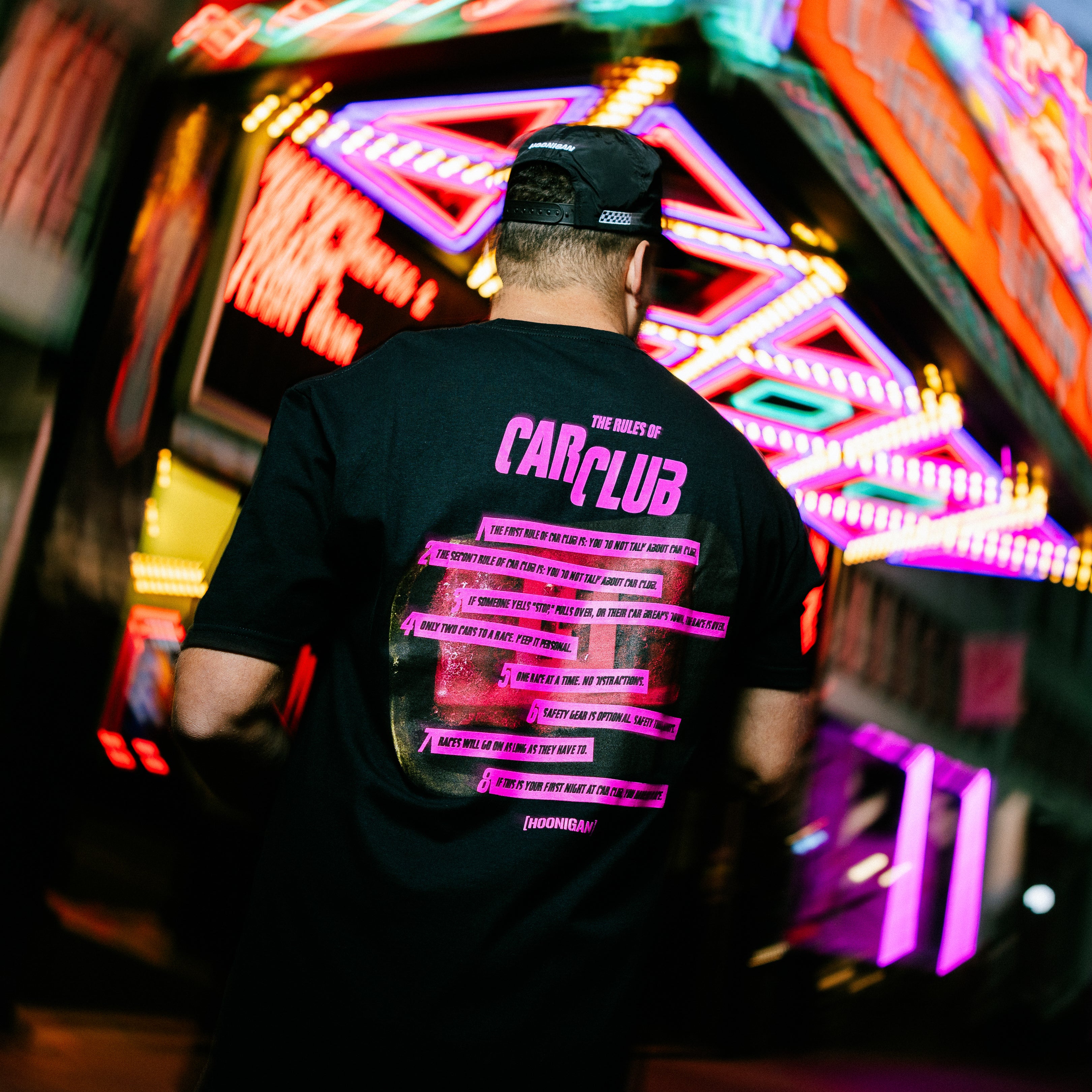 Hoonigan CAR CLUB short sleeve tee in black, featuring a bold white graphic logo on the front.