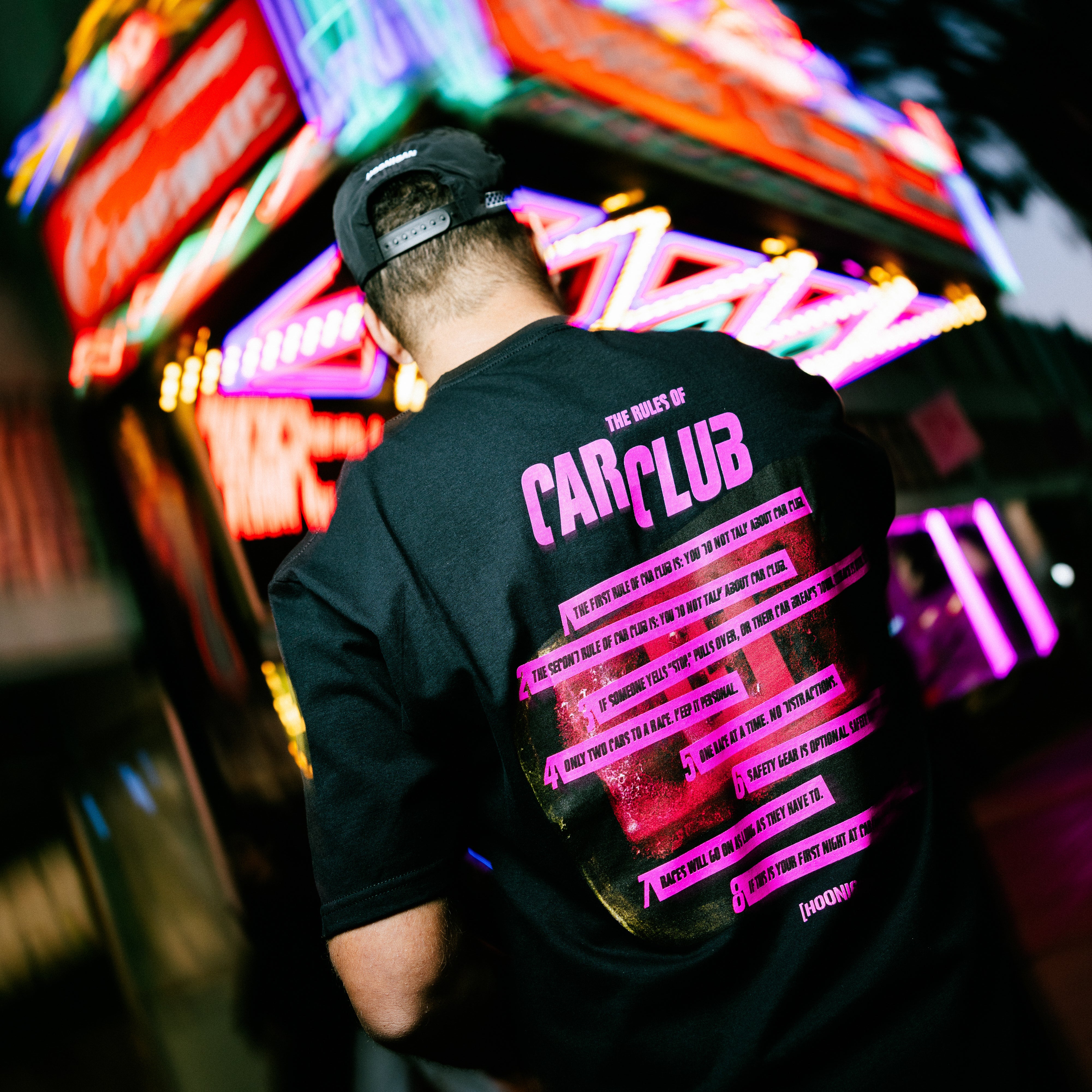 Hoonigan CAR CLUB short sleeve tee in black, featuring a bold car-themed graphic on the front.