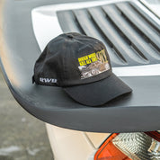 Hoonigan x RWB ROUGH WORLD KILL ALL TIRES black unstructured strapback hat with embroidered logo.