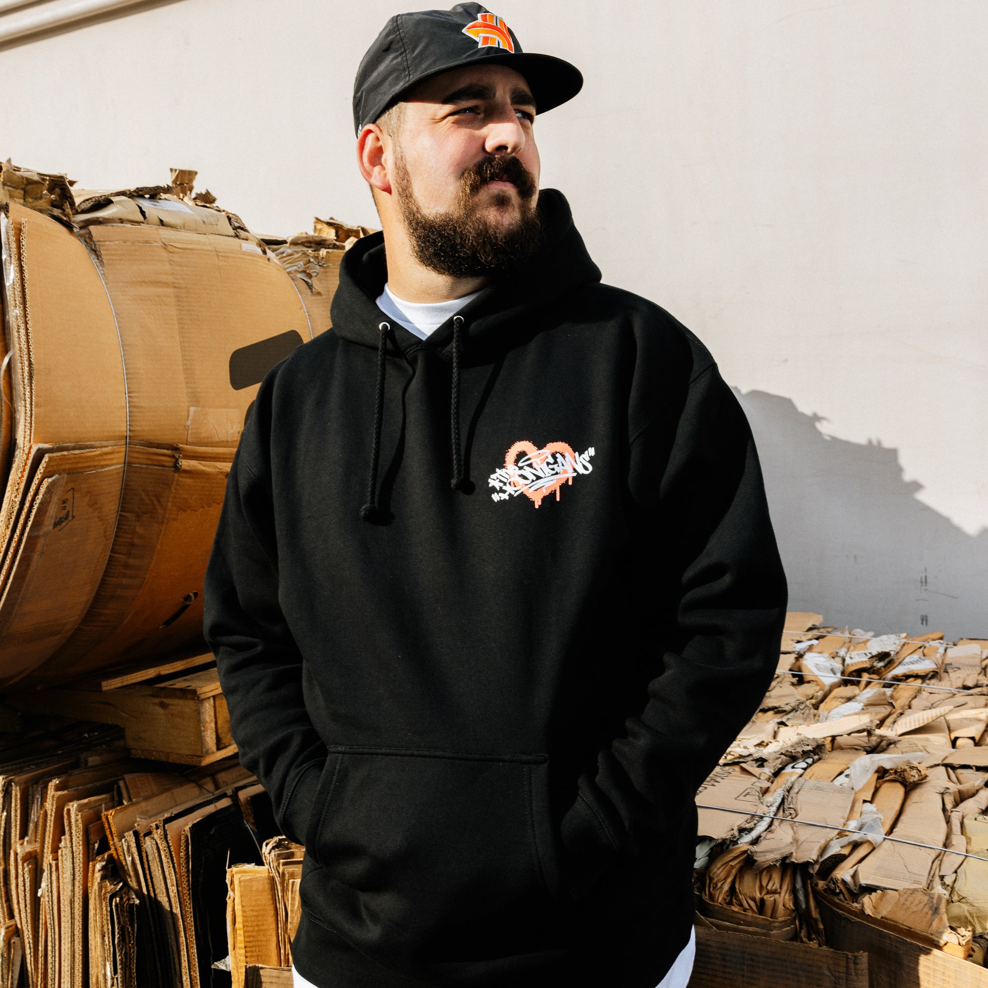 Black Hoonigan FIND OUT pullover hoodie featuring a bold white logo on the front and a comfortable, casual fit.