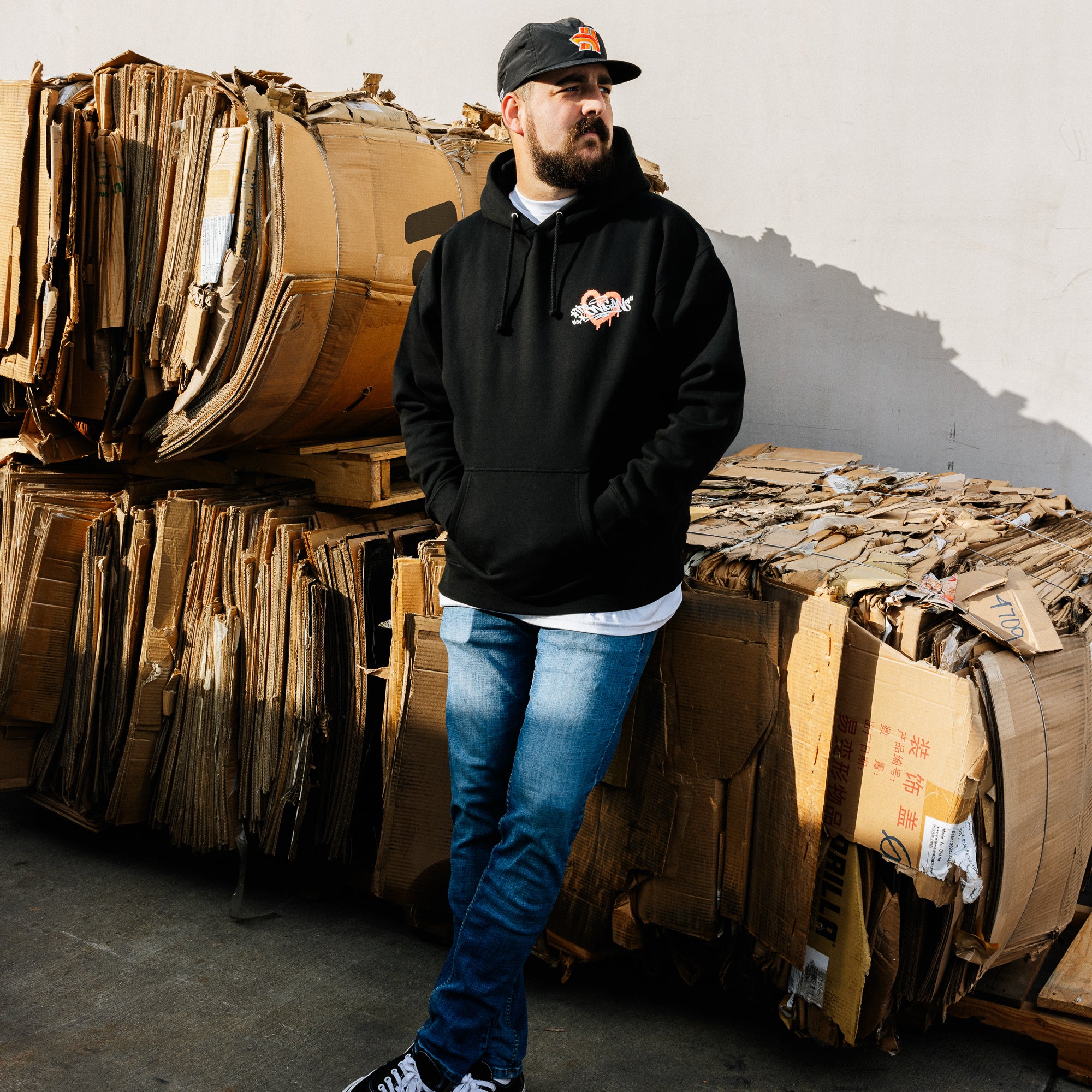 Black Hoonigan FIND OUT pullover hoodie featuring a bold graphic design on the front.