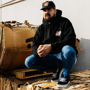 Black Hoonigan FIND OUT pullover hoodie featuring a graphic logo on the front and a drawstring hood.