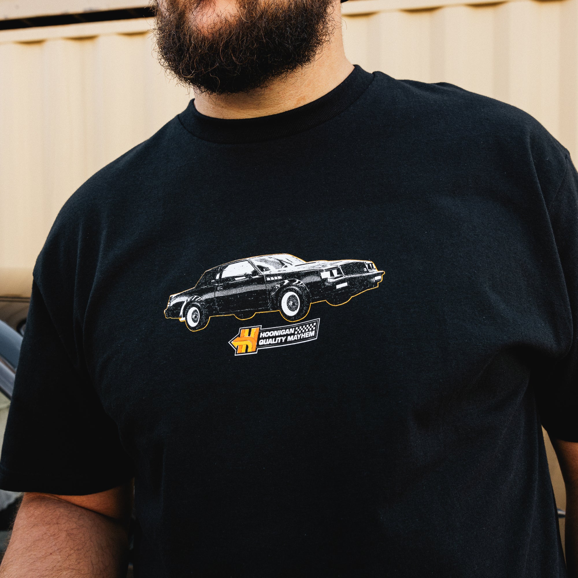 Hoonigan HNX Short Sleeve Tee in black, featuring a bold white logo and graphic design.