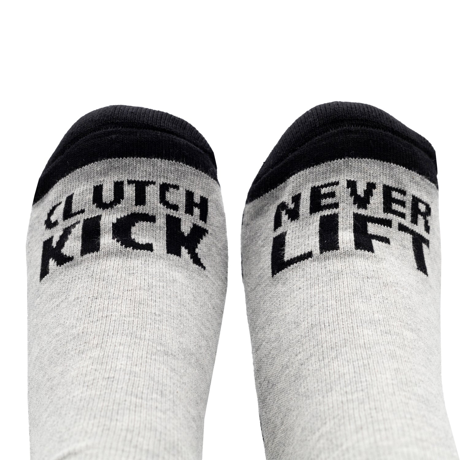 Black Hoonigan NEVER LIFT socks featuring white bold lettering and a logo, ideal for motorsport enthusiasts.