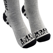 Hoonigan NEVER LIFT socks featuring a black and white design with bold logos and graphics.