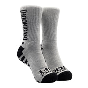 Hoonigan NEVER LIFT Socks featuring a bold black design with white text and logo.