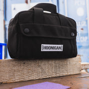 Hoonigan CENSOR BAR Tool Bag, showcasing durable black fabric with bold logo and multiple compartments for tools.