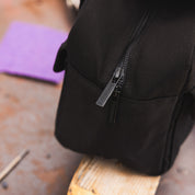 Hoonigan CENSOR BAR Tool Bag in black, featuring multiple storage pockets and the Hoonigan logo on the front.