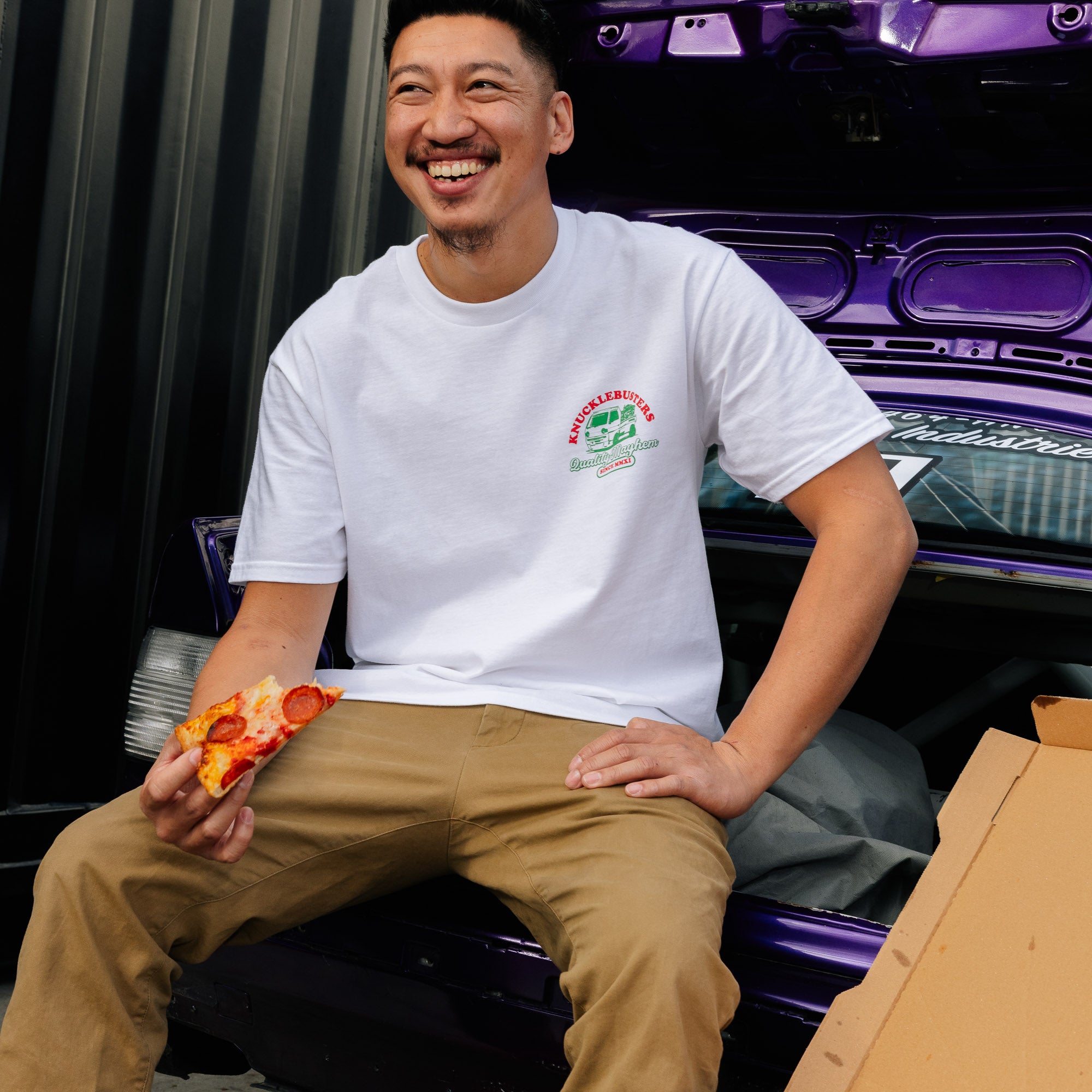 Hoonigan SPEED DELIVERY Short Sleeve Tee featuring a bold graphic design on a black background.