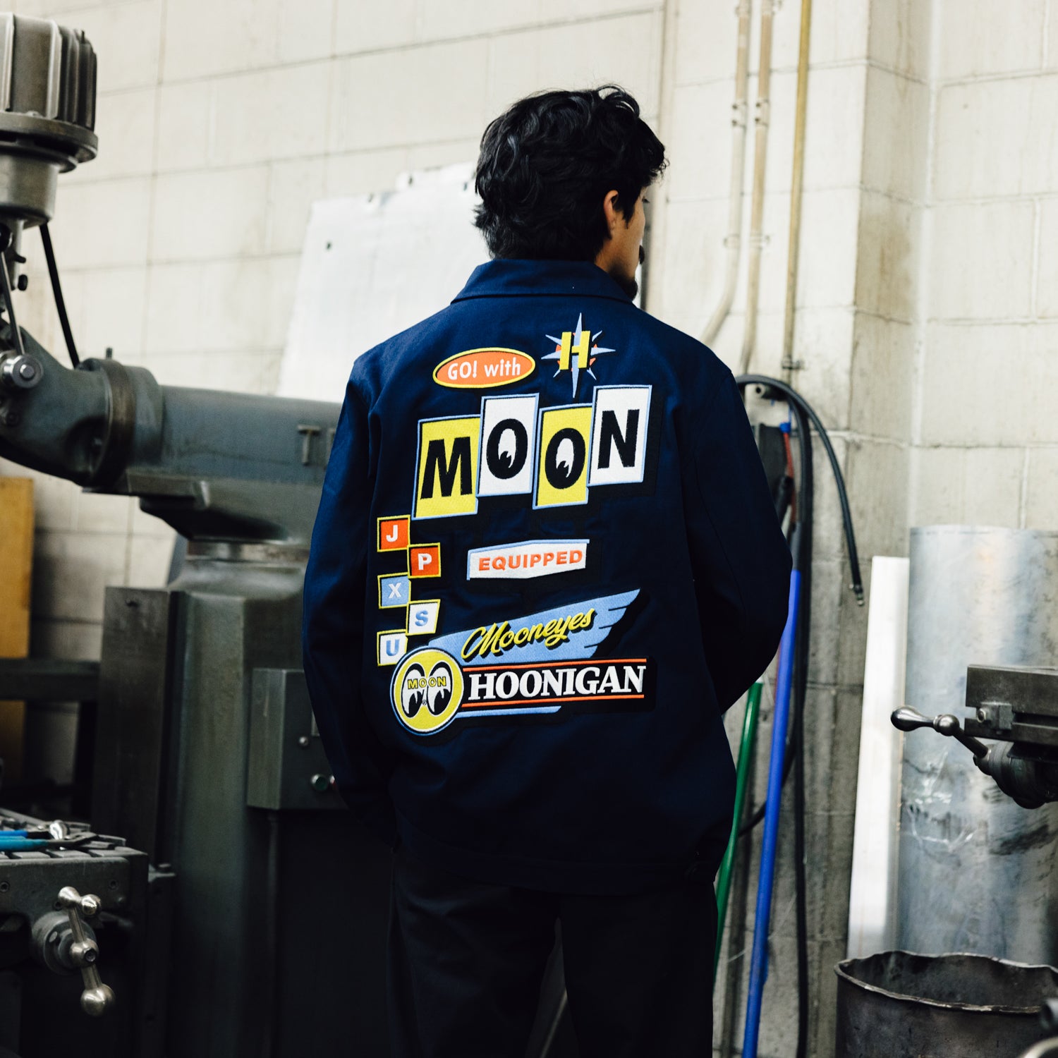 Hoonigan x Mooneyes MOON MOTEL Jacket featuring a black design with bold graphic prints and a relaxed fit.