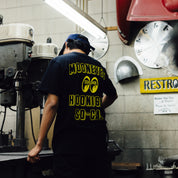 Hoonigan x Mooneyes SOCAL Short Sleeve Tee featuring bold graphic design on a black background.