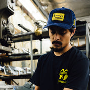 Hoonigan x Mooneyes MOONIGANS unstructured strapback hat, featuring a black design with white logo embroidery.