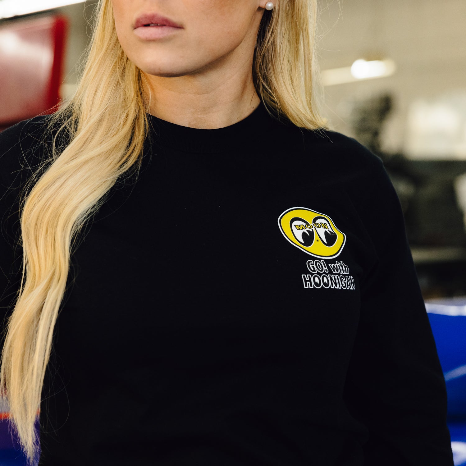 Hoonigan x Mooneyes "GO WITH HOON" long sleeve tee featuring bold graphic designs and a comfortable fit, displayed on a white background.