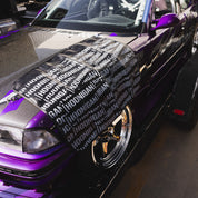 Hoonigan SCATTER PRINT Fender Cover featuring a vibrant, multicolored design with the Hoonigan logo.