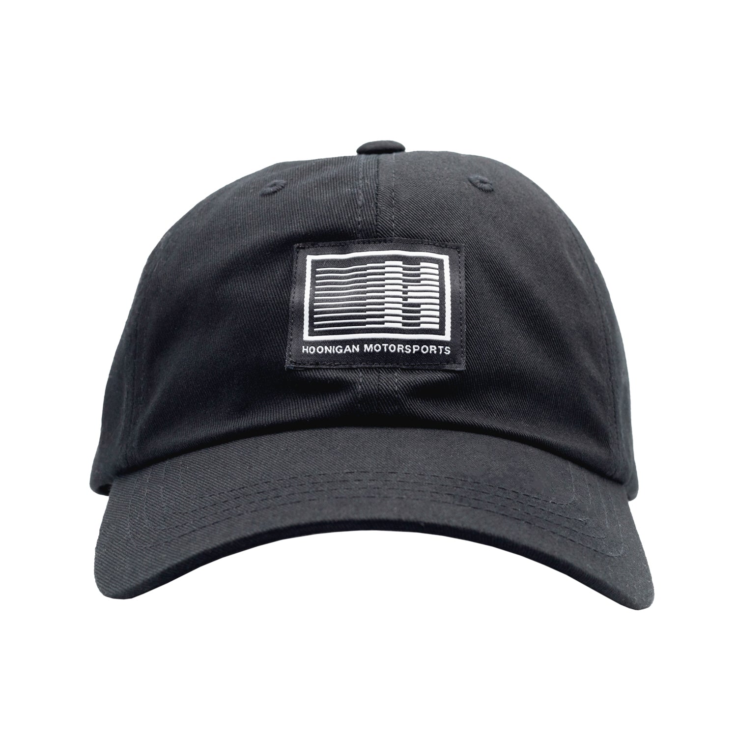 Black unstructured dad hat featuring the Hoonigan Motorsports logo embroidered on the front.