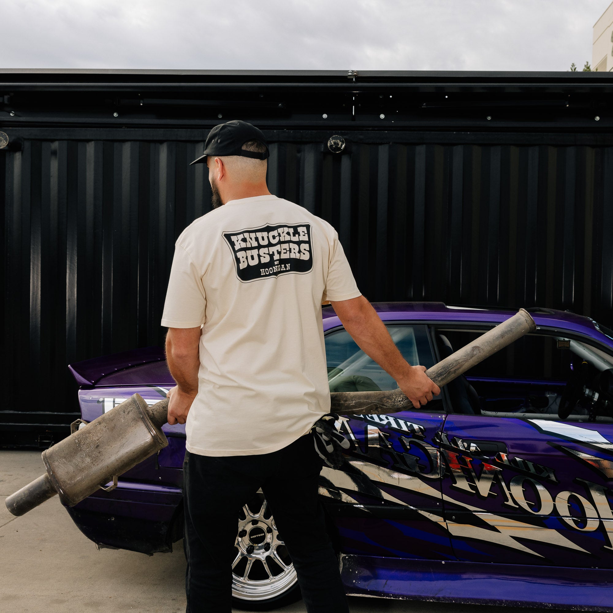 Hoonigan Belt Sander Short Sleeve Tee featuring a bold graphic design and logo on a black fabric.