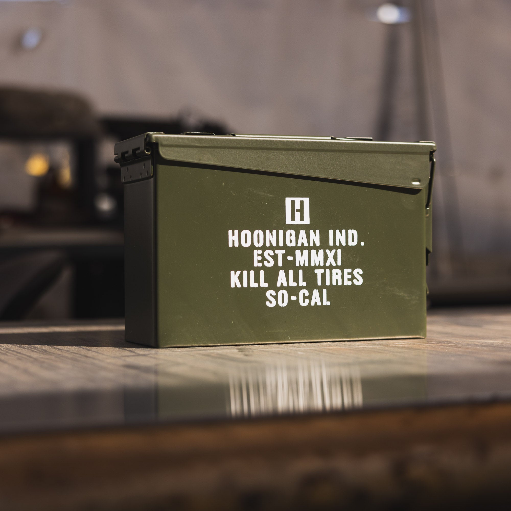 Hoonigan AMMO Box featuring a rugged design, black color with graphic branding, suitable for storage and transport.