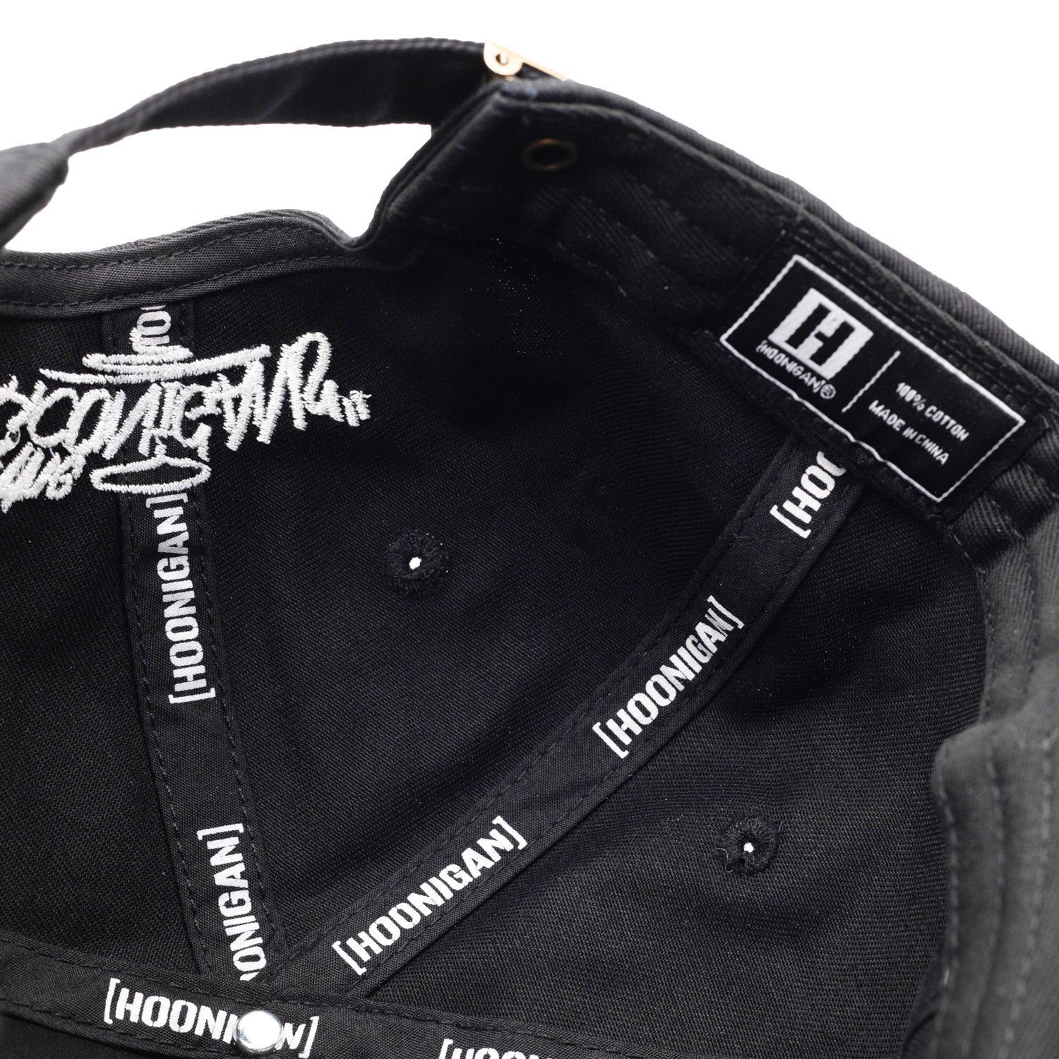 Hoonigan FIND OUT unstructured strapback hat in black with white logo embroidery.