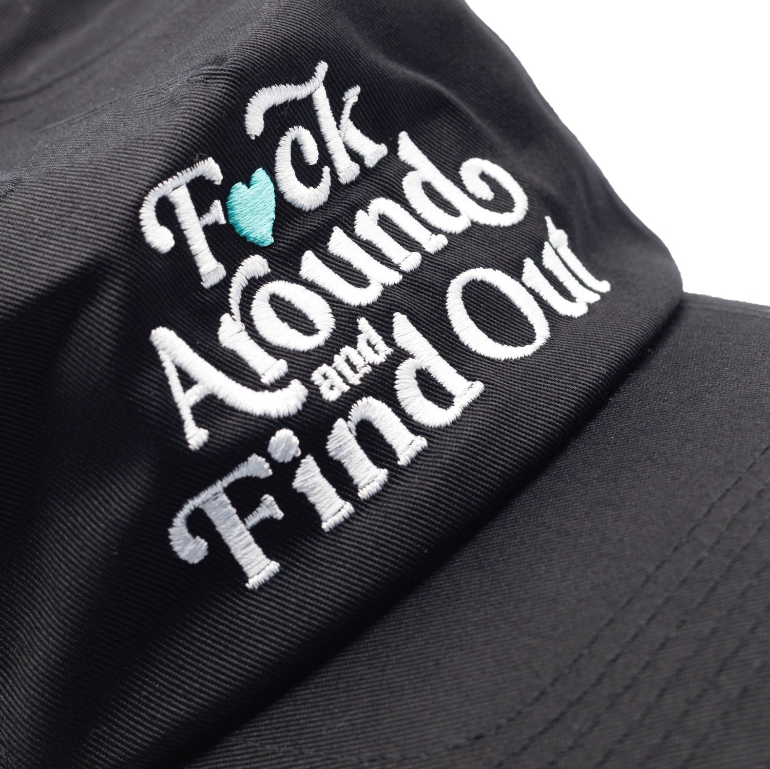 Hoonigan FIND OUT Unstructured Strapback Hat featuring a black design with embroidered logo on the front.