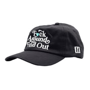 Hoonigan FIND OUT unstructured strapback hat in black with white logo embroidery.