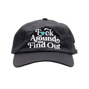 Hoonigan FIND OUT Unstructured Strapback Hat in black with white logo embroidery.