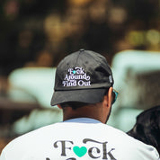 Hoonigan FIND OUT unstructured strapback hat in black with embroidered logo on the front.