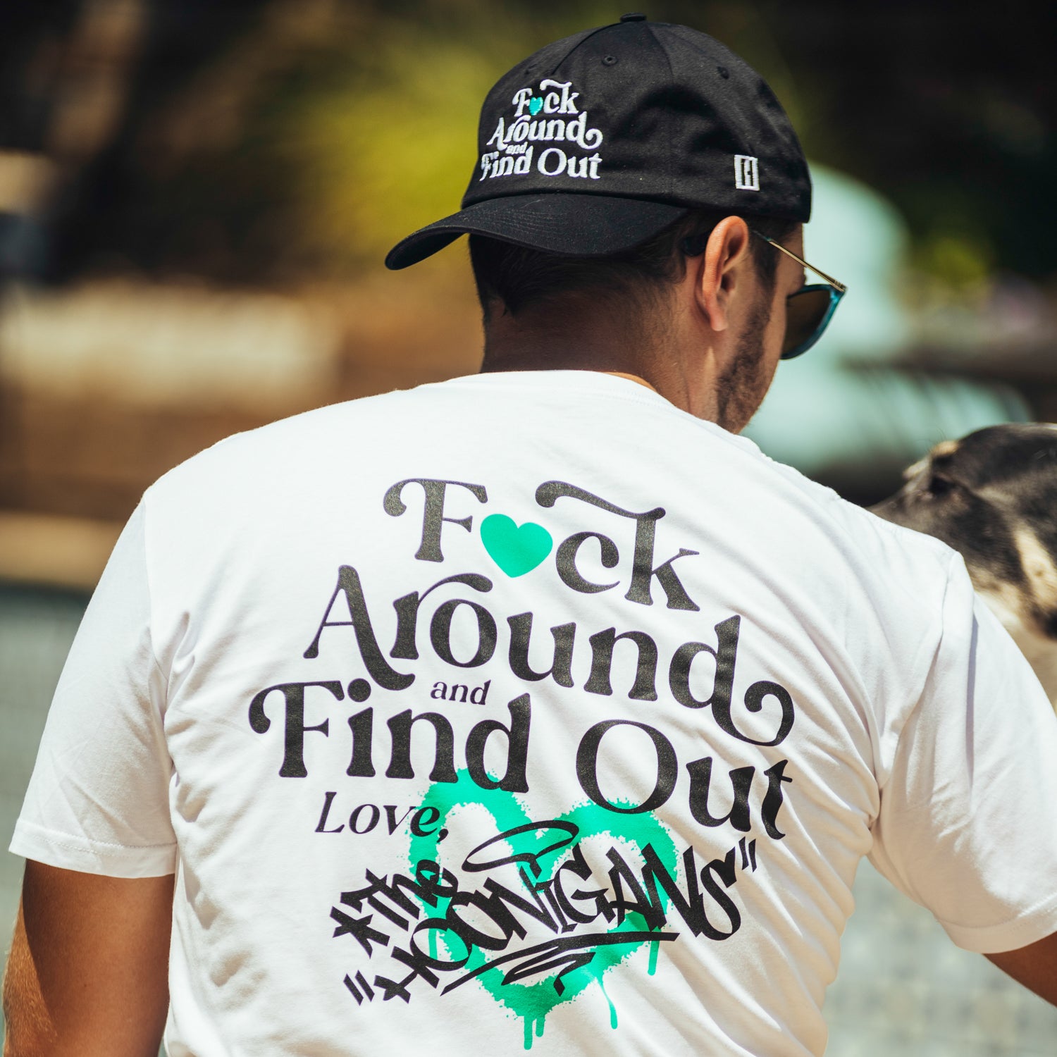 Hoonigan FIND OUT 2.0 Short Sleeve Tee featuring a black design with a bold graphic logo on the front.