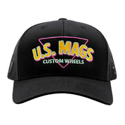 Black trucker hat featuring colorful "U.S. MAGS CUSTOM WHEELS" embroidery on the front, perfect for automotive enthusiasts.