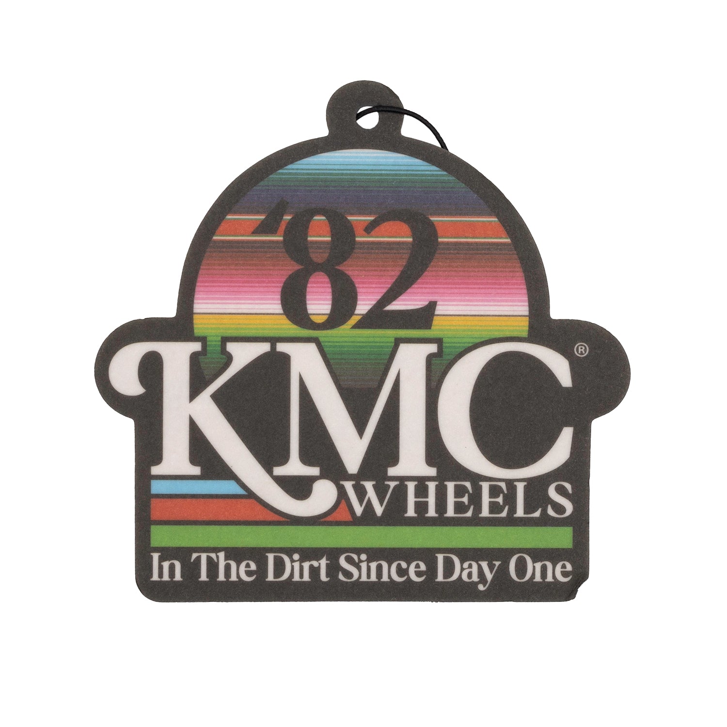 KMC NATIVES Air Freshener in a sleek bottle with a minimalist design, featuring a green and white color scheme and a decorative label.