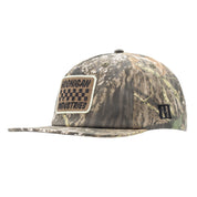 Hoonigan SPRINT unstructured snapback hat in camouflage with a patch logo, perfect for motorsport enthusiasts.