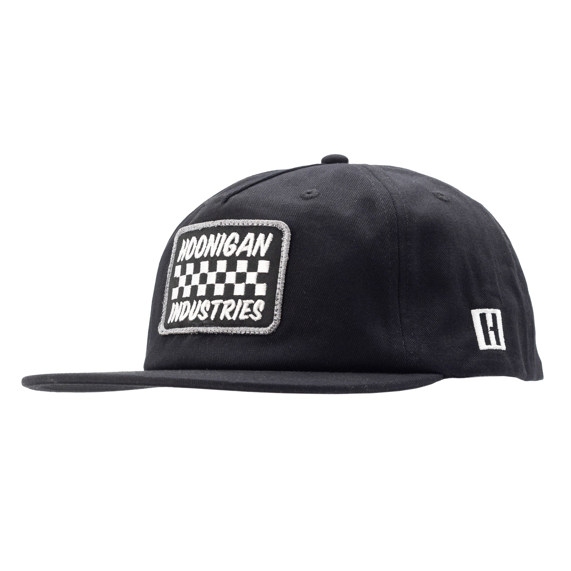 Black unstructured snapback hat featuring a checkered patch with "Hoonigan Industries" embroidered on the front.