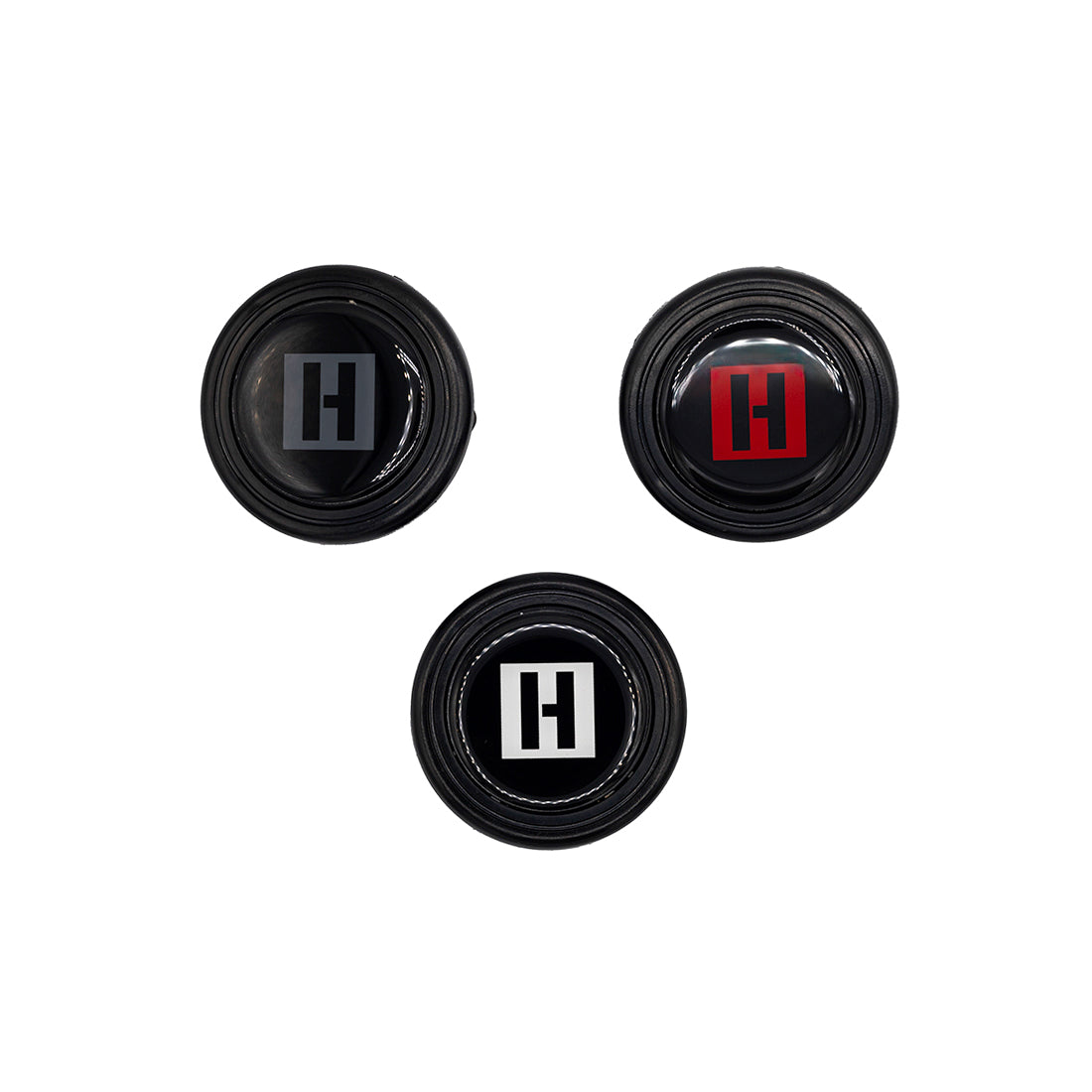 Hoonigan H BOX HORN button featuring a sleek black design with a bold H logo in white, mounted on a silver base, ideal for racing or automotive enthusiasts.