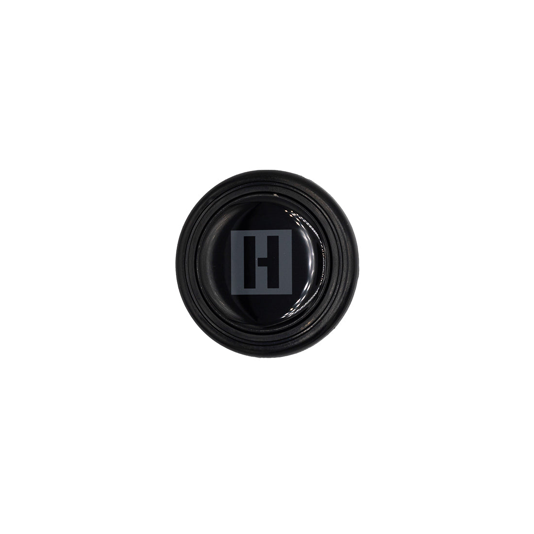 Hoonigan H BOX HORN Button featuring a sleek black design with a red Hoonigan logo and a classic horn symbol.