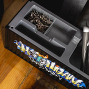 Hoonigan X Spen1 mini shipping container in vibrant red with black graphic designs, featuring the Hoonigan logo and intricate artwork.