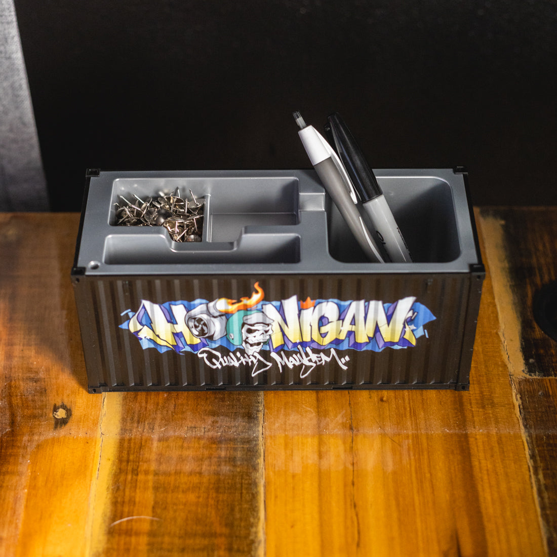 Hoonigan X Spen1 custom MINI SHIPPING CONTAINER in vibrant colors with graffiti-style artwork.