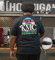 KMC DAY ONE Short Sleeve Tee displayed from the back, featuring a stylish black design suitable for casual wear.