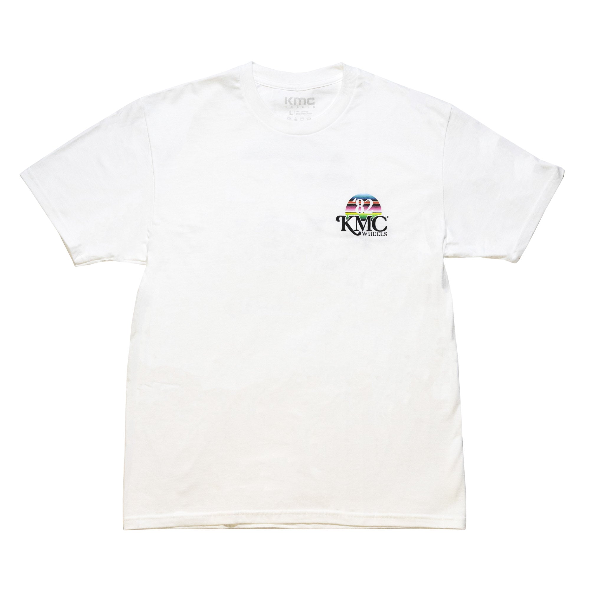 White KMC DAY ONE short sleeve tee with colorful logo and "82" graphic on the front left chest.