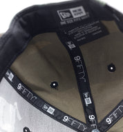 KMC BLANKET snapback hat in black with a camouflage pattern and adjustable strap.