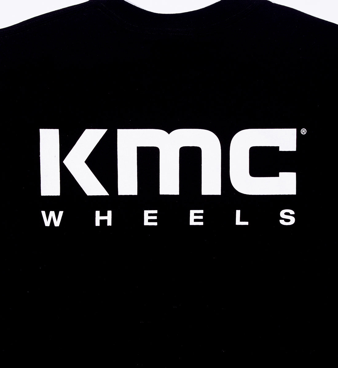Black short sleeve tee featuring the KMC logo prominently displayed on the back.