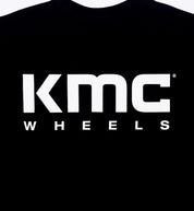 Black short sleeve tee featuring the KMC logo prominently displayed on the back.
