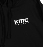 KMC Logo Hoodie featuring a prominent white logo on a black background, designed for casual wear.