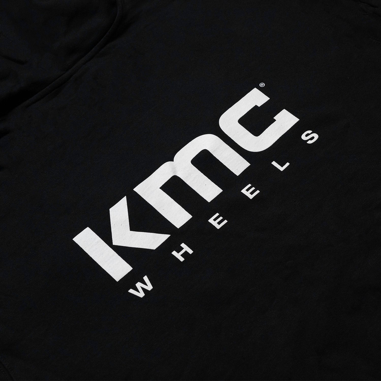 KMC Wheels logo hoodie featuring a black design with a prominent white logo on the chest.